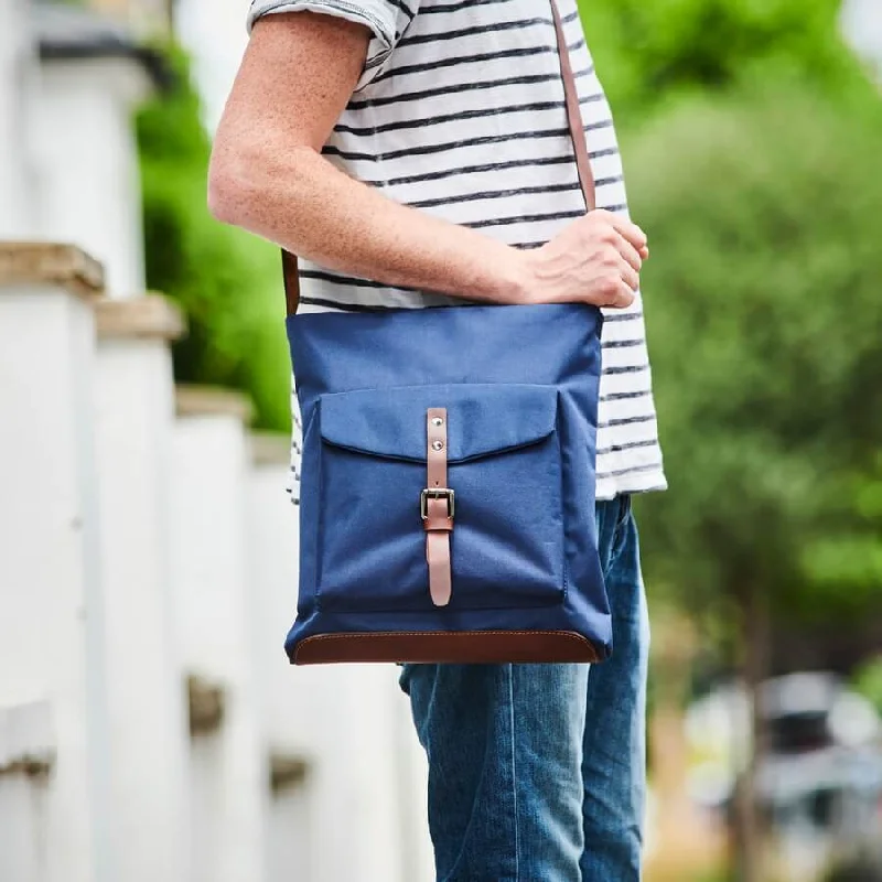 Navy with dark brown leather